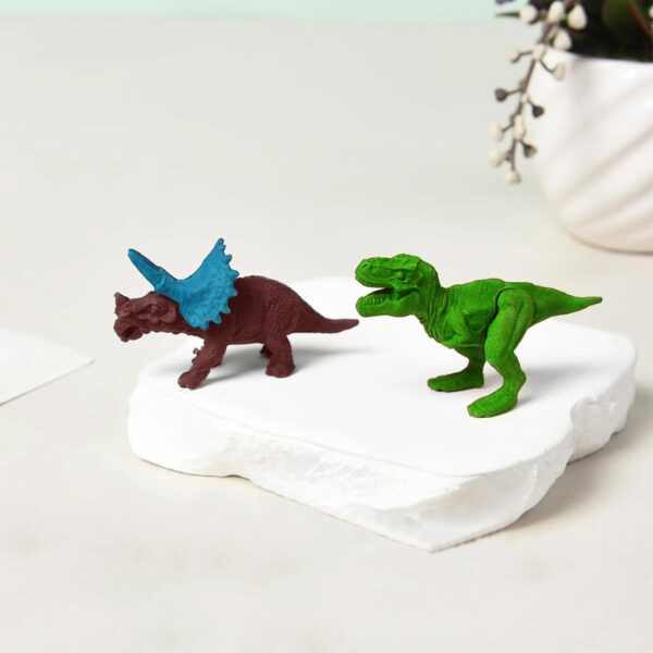 617Up30SJdL._SL1500_.jpg Set of 4 Miniature Unique Decoration Items Gifts for Kids Rubber Dinosaur Miniature Eraser Stationary Set for Kids Amazon.in Home & KitchenRufus AI